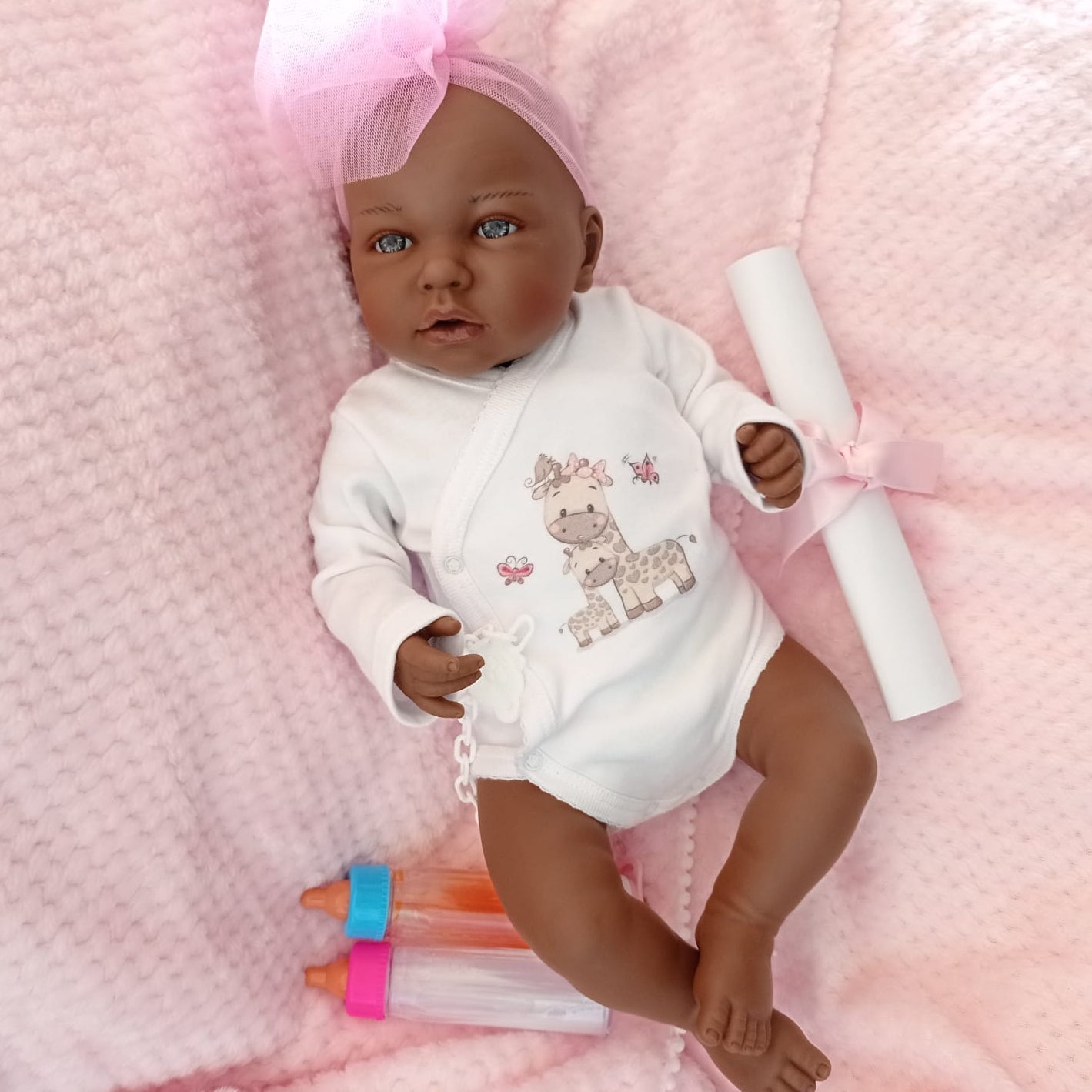 Bebe Reborn Muñeca Reborn Africa- 48cm y 2kg - Vinilo Blando, Cuerpo Tela y Caida de Cabeza