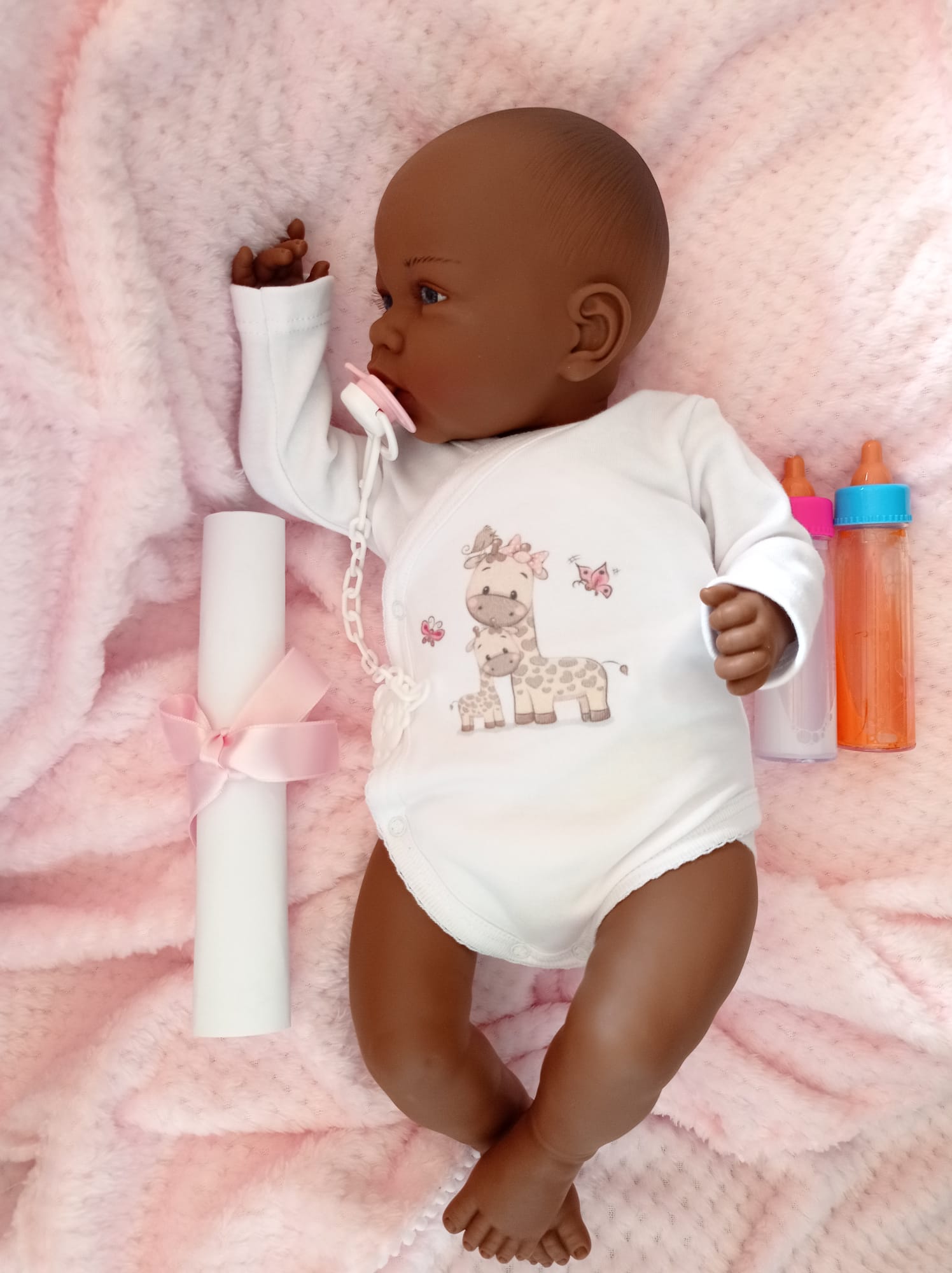 Bebe Reborn Muñeca Reborn Africa- 48cm y 2kg - Vinilo Blando, Cuerpo Tela y Caida de Cabeza