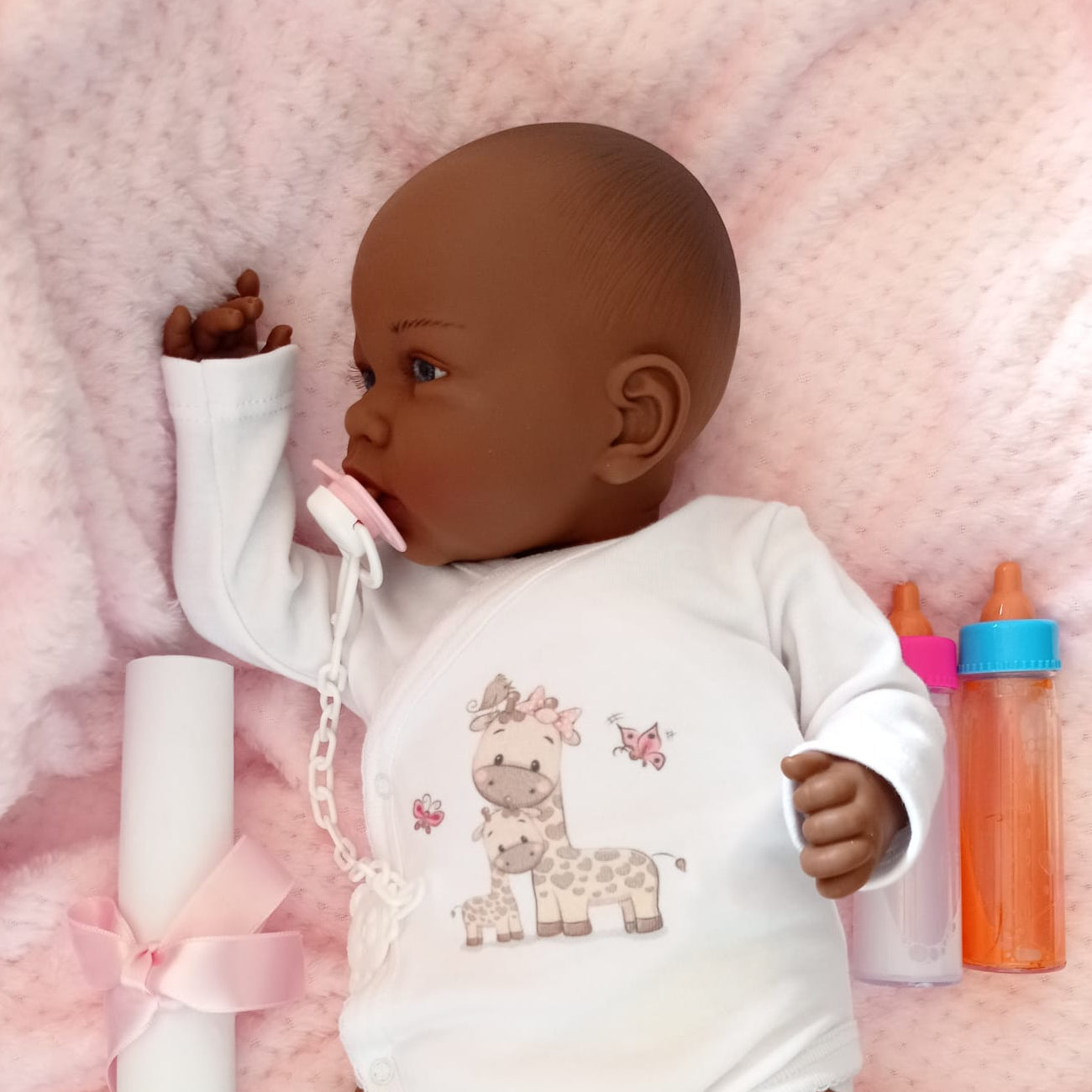 Bebe Reborn Muñeca Reborn Africa- 48cm y 2kg - Vinilo Blando, Cuerpo Tela y Caida de Cabeza